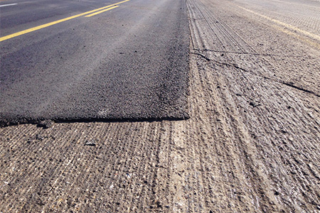 Milled pavement being prepared for resurfacing on Oakwood Avenue in Huntsville