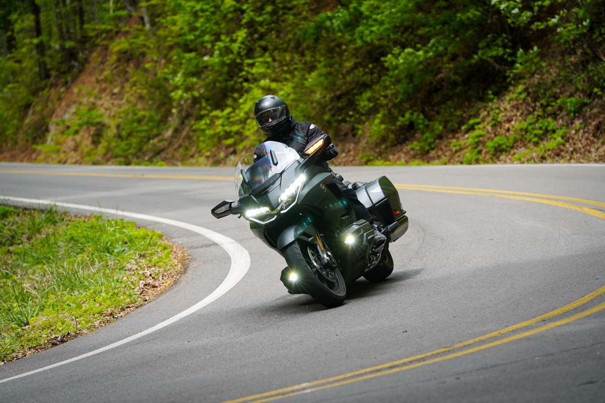 John leaning his motorcycle through a curve on the Tail of the Dragon
