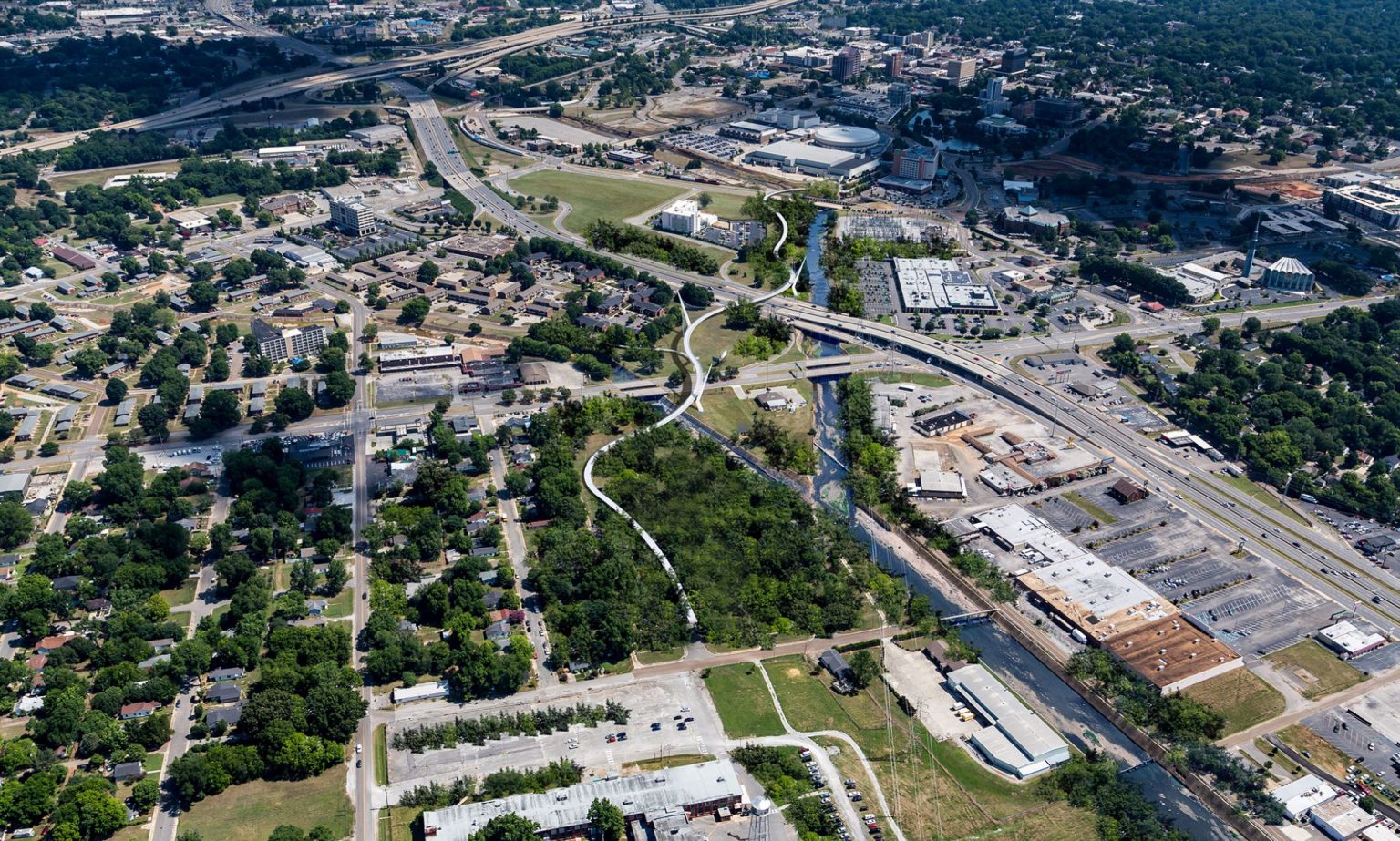 Official rendering showing the planned PARC pedestrian and bicycle bridge crossing Governors Drive and Memorial Parkway