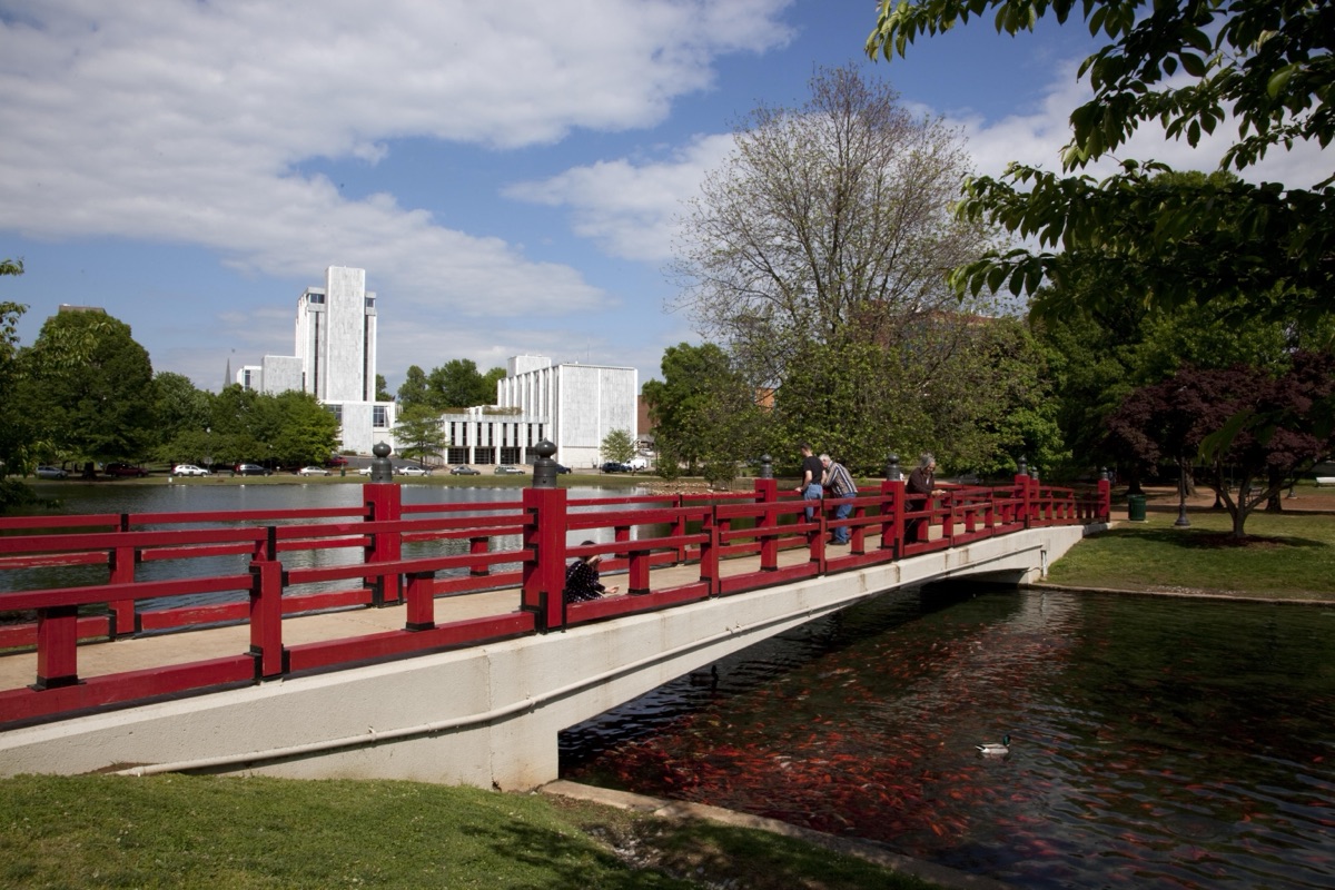 The red bridge at Big Spring Park with downtown Huntsville behind it